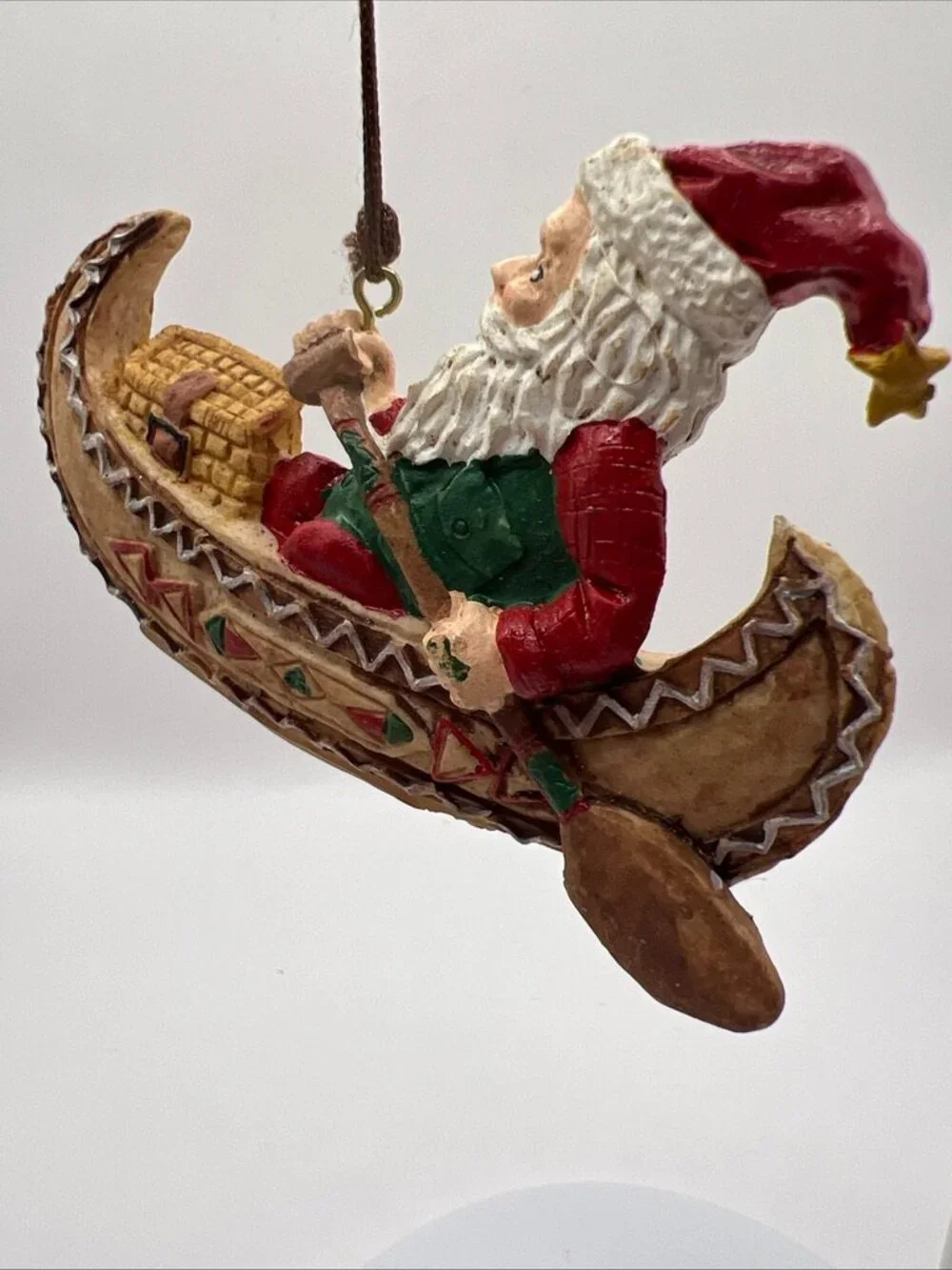 Vtg Santa Paddling His Canoe Folk Art Christmas Ornament 2x3.5”